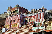 Varanasi , Kedara Ghat with the red and white-striped temple of Kedaresvara lingam